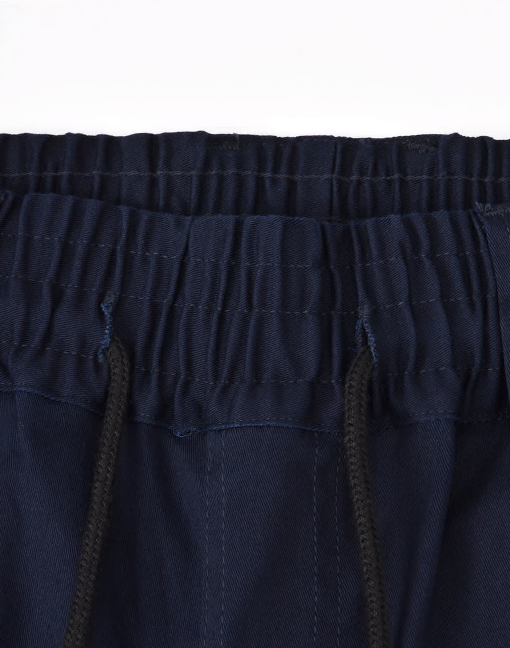 Dark navy unisex cotton stretch drill cuffed work pants with an elastic waistband and drawstring detail.