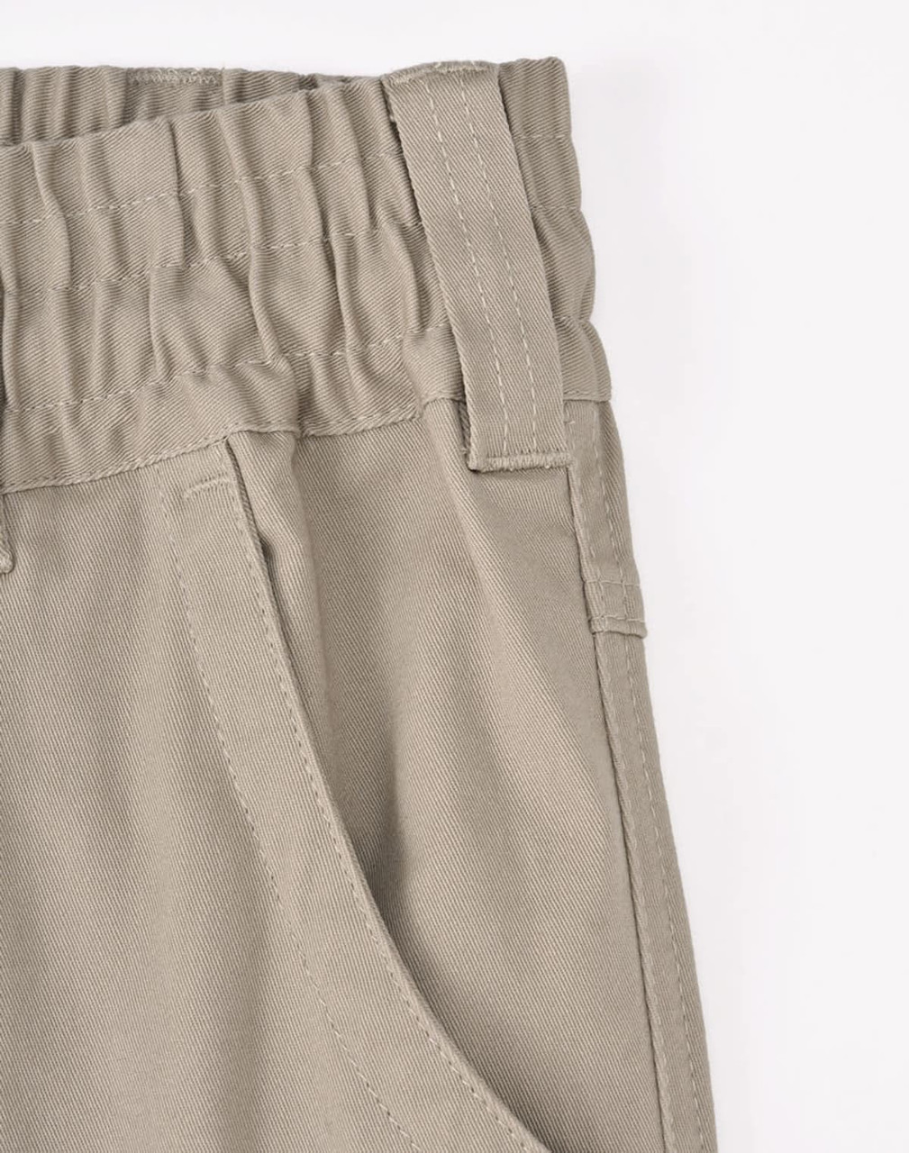 Unisex cotton stretch drill cuffed work pants in light khaki, featuring an elastic waistband and front pockets.