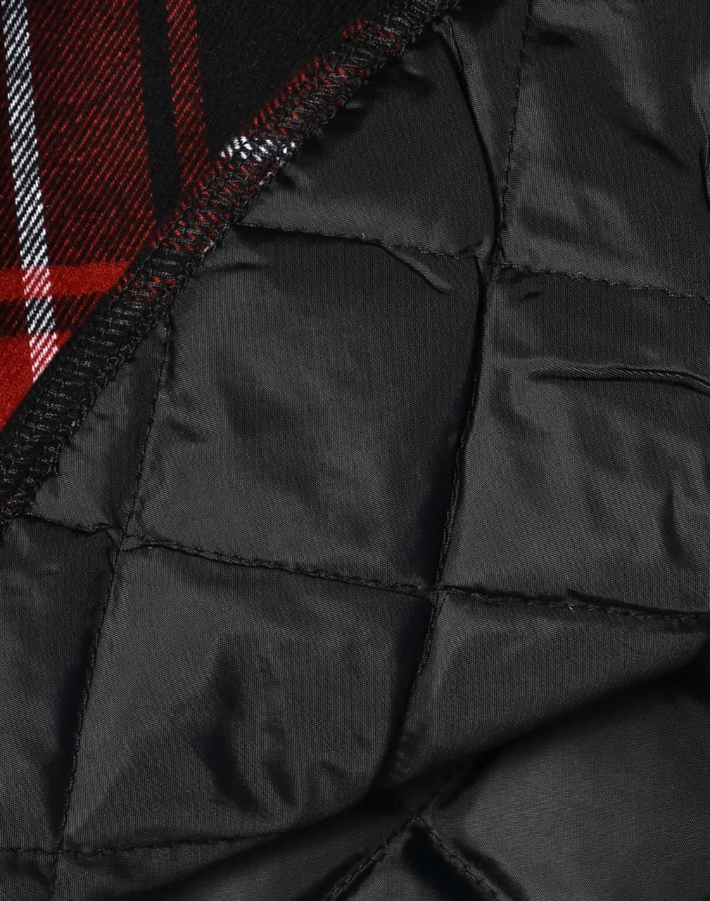 A black quilted flannel shirt with a red and black checkered pattern inside and a logo present.