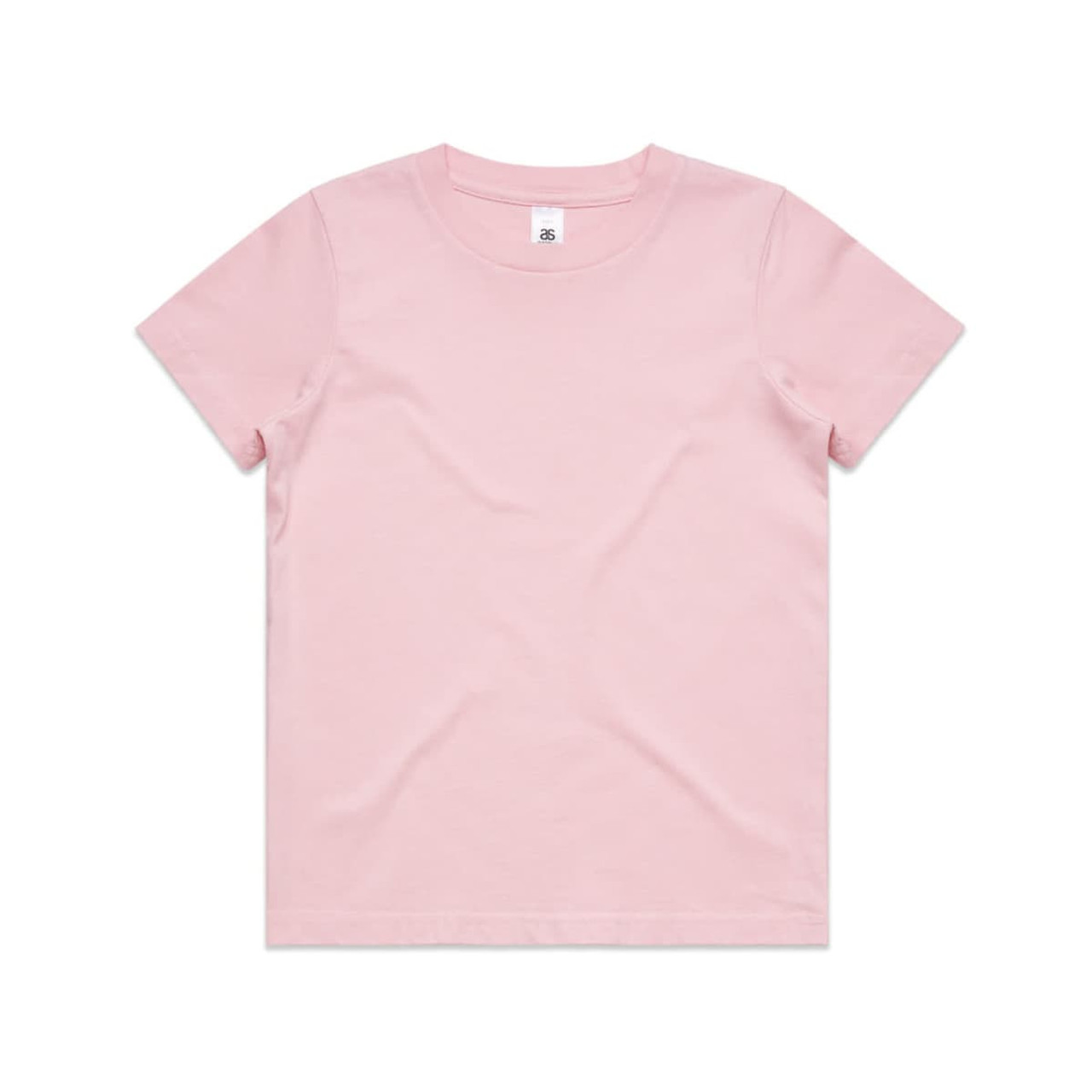 A pink Kids Staple Tee with a standard crew neckline and short sleeves. It features a logo on the label. A pink Kids Staple Tee with a standard crew neckline and short sleeves. It features a logo on the label.