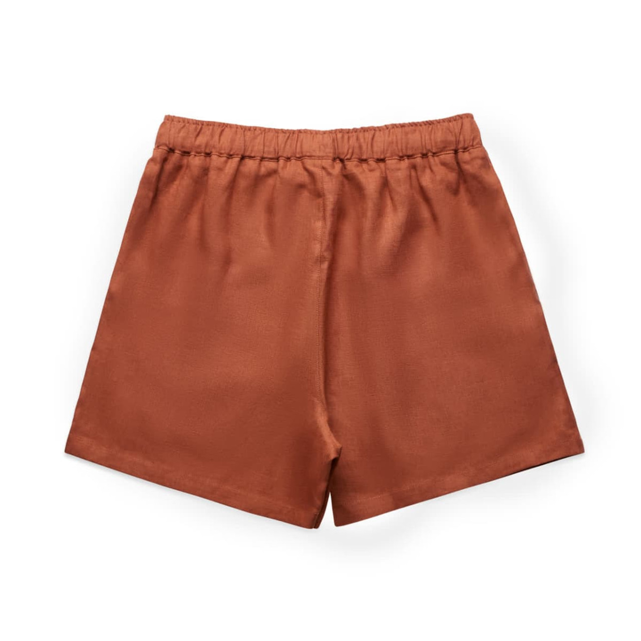 Rust-coloured linen shorts with an elastic waistband. The back view highlights a simple, smooth design. Rust-coloured linen shorts with an elastic waistband. The back view highlights a simple, smooth design.