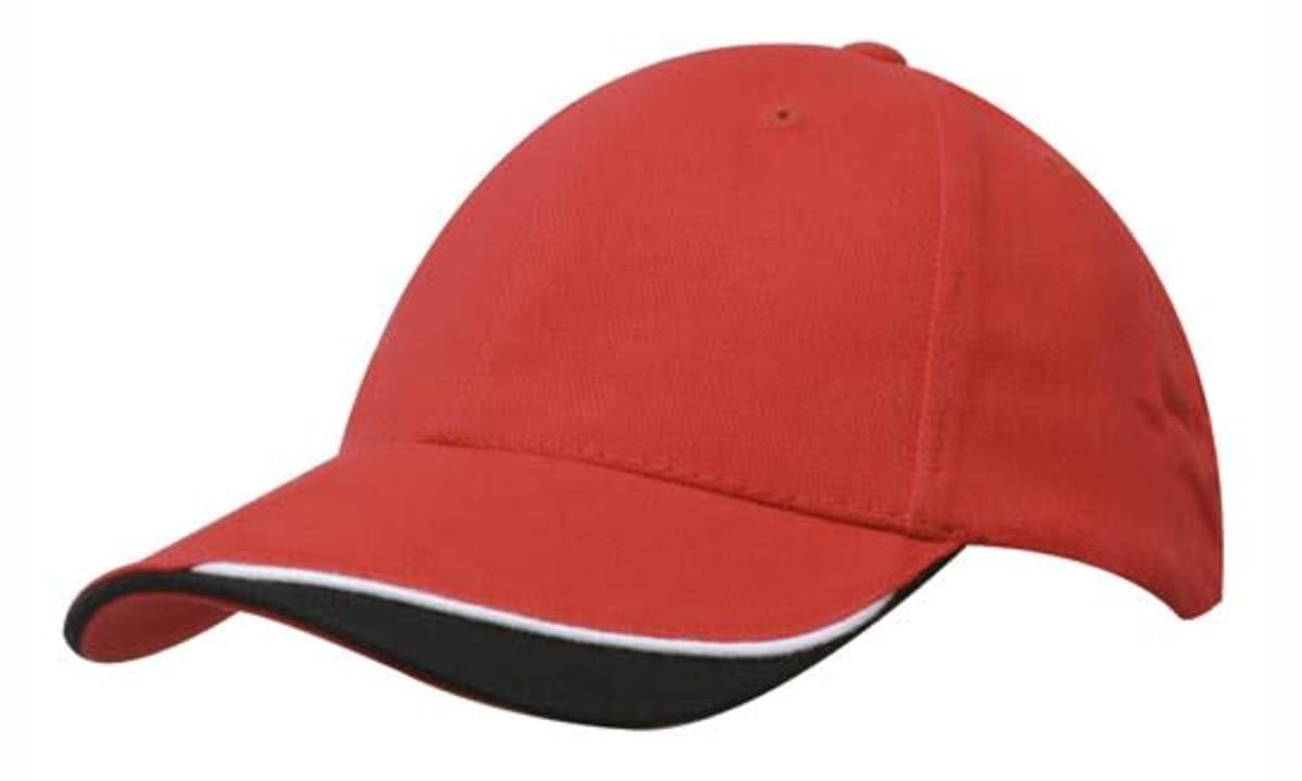 A red cap with an indented peak, featuring a contrasting black brim and a logo on the front.