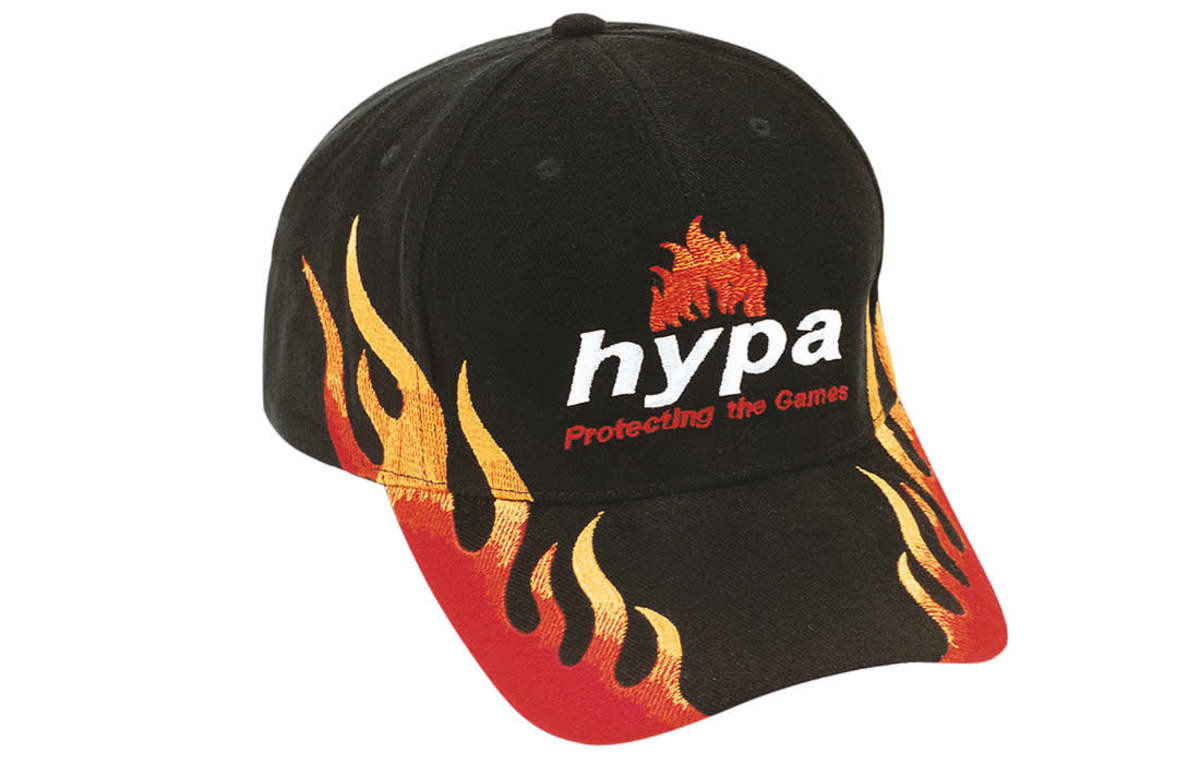 A black cap featuring flame designs in red and orange, with a logo on the front.