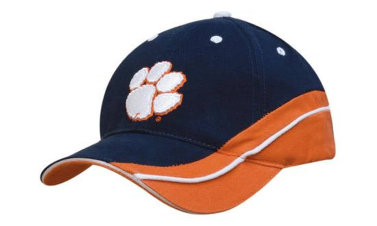 A navy blue and orange cap with a logo on the front and a contrasting peak. It features a sandwich-style design.