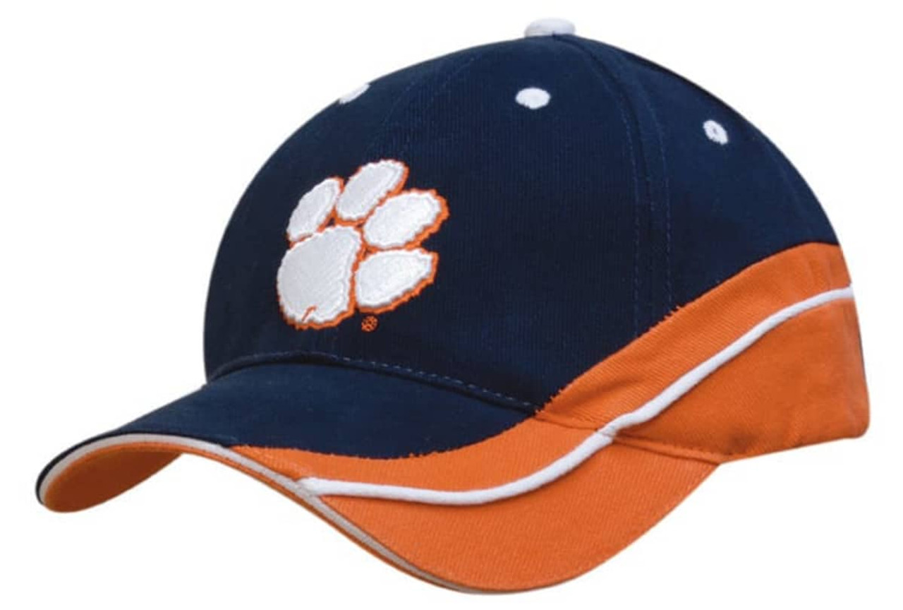 A navy cap with an orange peak and sandwich detail, featuring a logo on the front and white stitching. A navy cap with an orange peak and sandwich detail, featuring a logo on the front and white stitching.