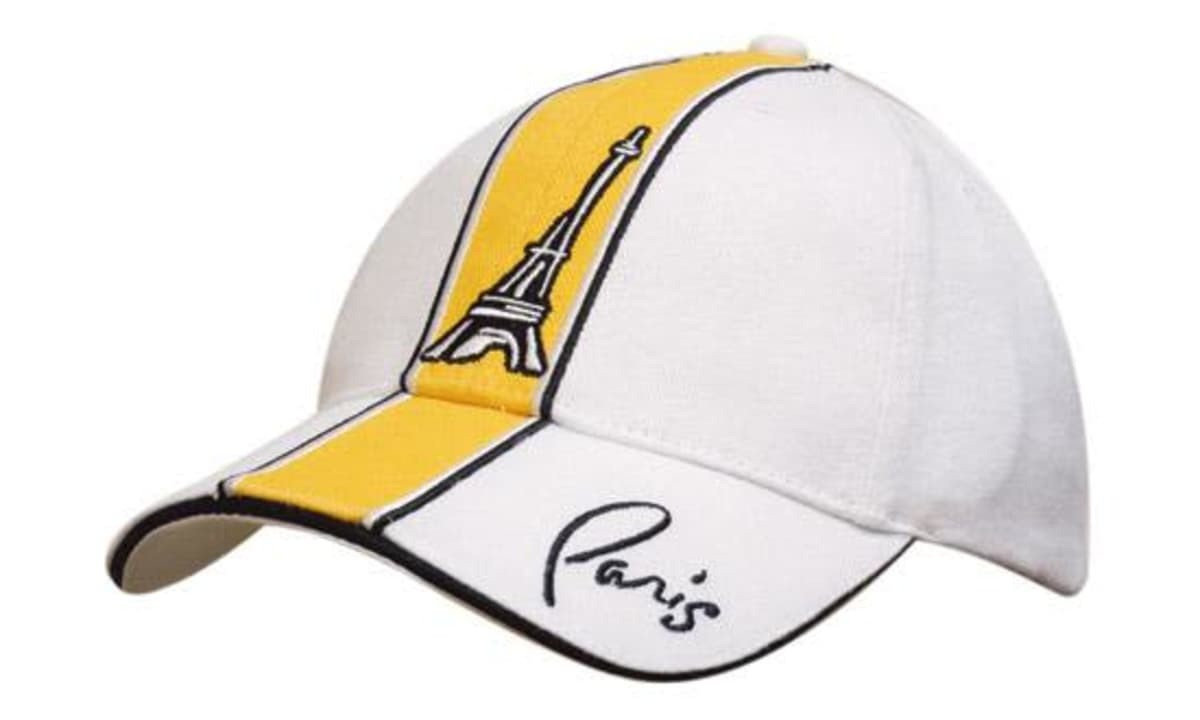 A white cap with a yellow stripe, featuring an Eiffel Tower design and embroidered trim.