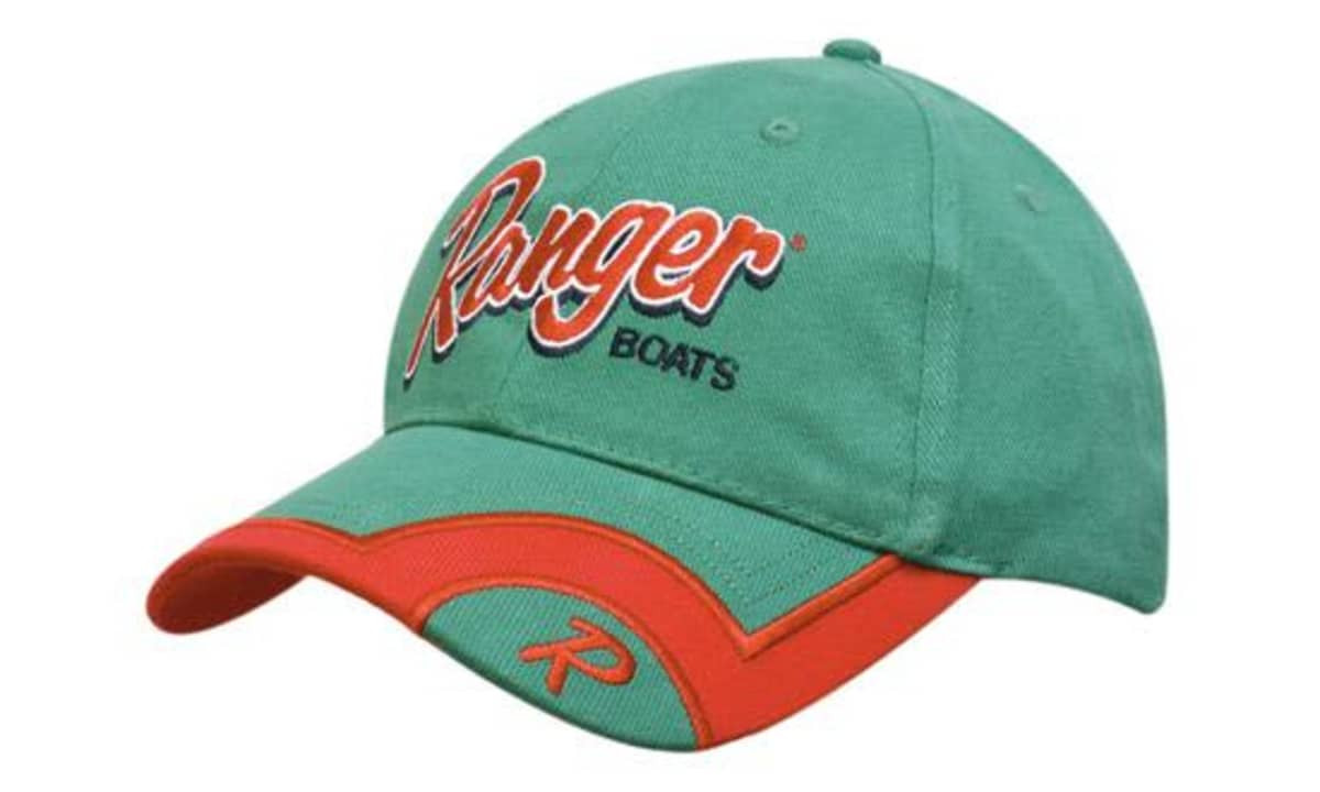 A green and orange cap featuring embroidered branding and a peak indent design.