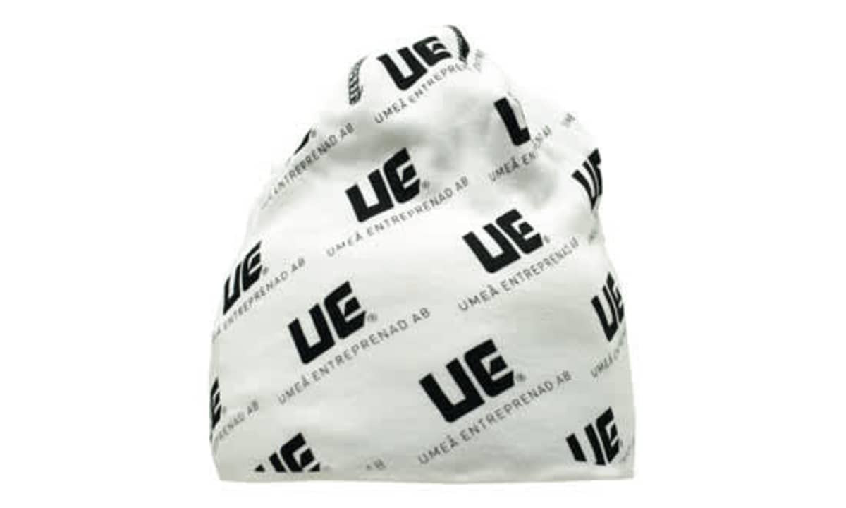 A white beanie with a repeated black logo pattern, featuring one prominent logo.