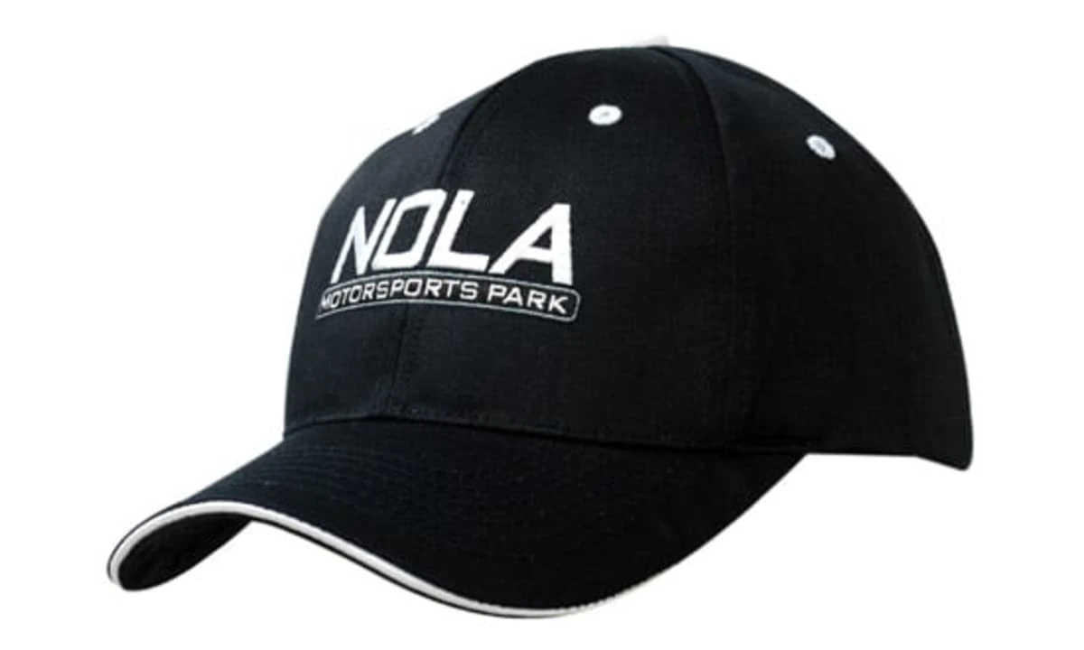 A black cap with sandwich trim and a logo. The cap features a curved brim and is made from recycled fabric.