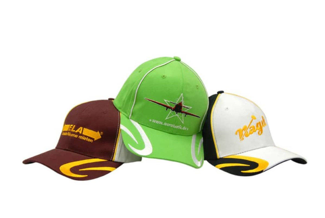 Three caps featuring a green cap with embroidery, a brown cap with a logo, and a white cap with yellow accents. Three caps featuring a green cap with embroidery, a brown cap with a logo, and a white cap with yellow accents.