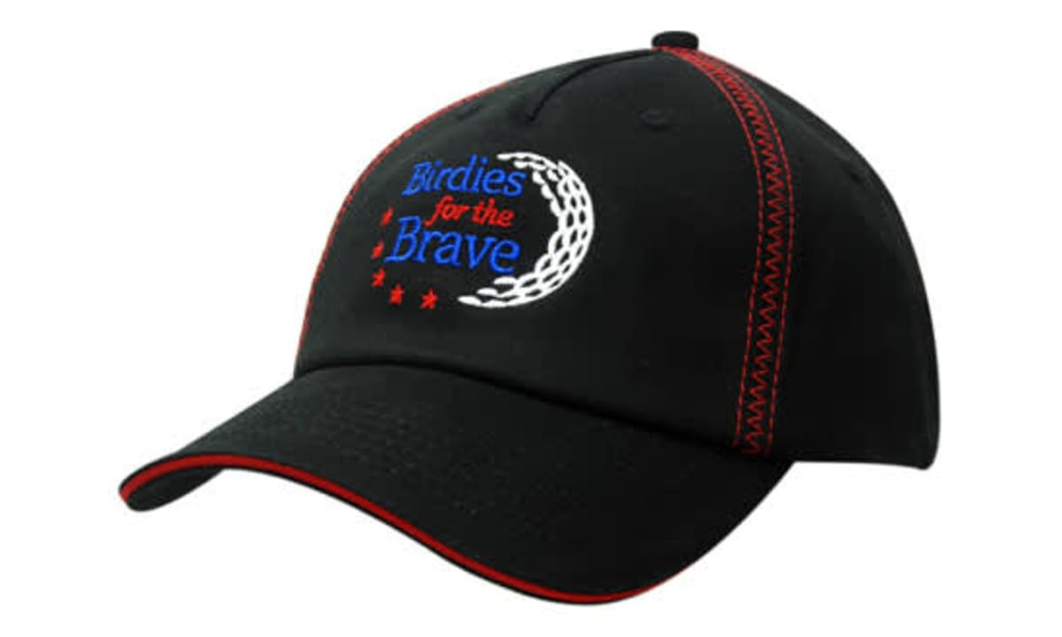 A black cap with red trim and zigzag crown stitching, featuring a logo on the front.