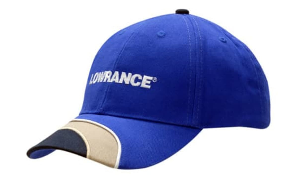 A blue cap with fabric inserts and piping on the crown and peak, featuring a logo on the front.