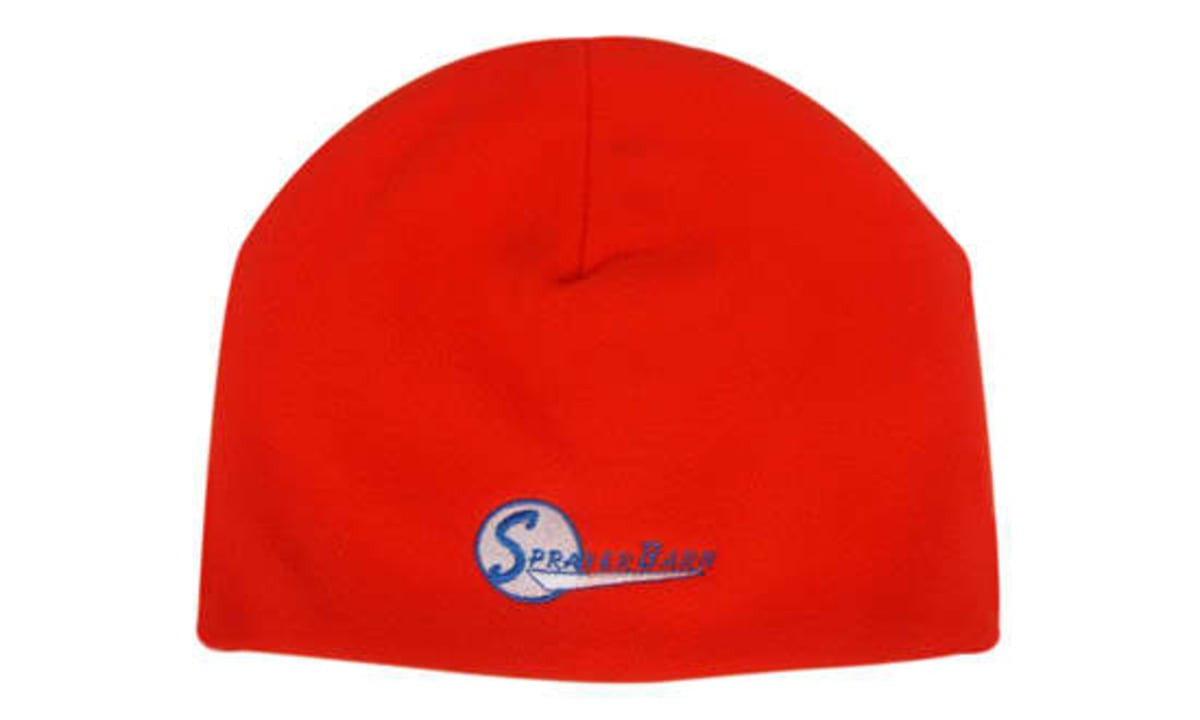 A bright red micro fleece beanie with a logo featured on the side. It has a smooth, soft texture.