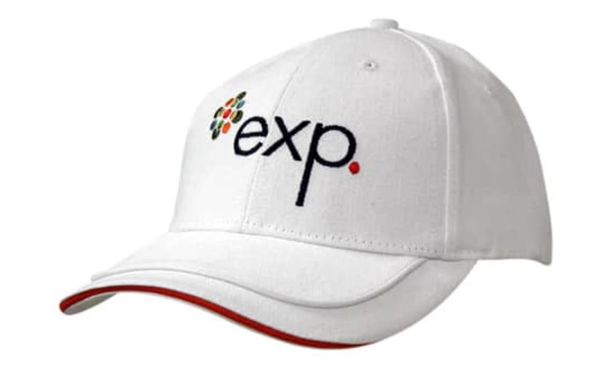 A white cap with a sandwich trim and piping on the peak, featuring an embroidered logo.