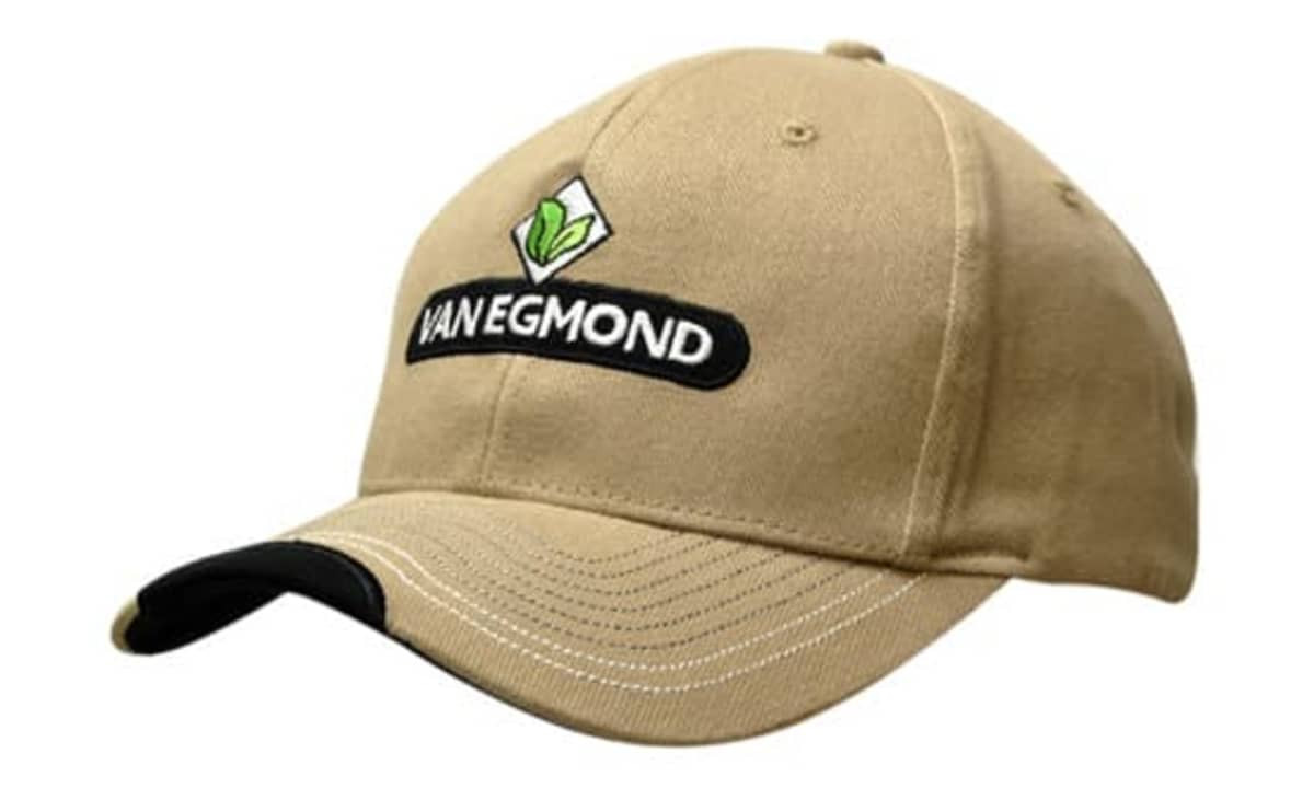 A beige cap with a black peak and contour trim, featuring a logo on the front.