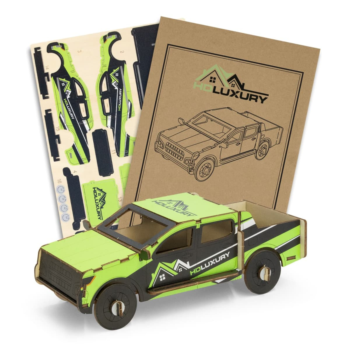A wooden model of a UTE in green and black, accompanied by design templates in a package.