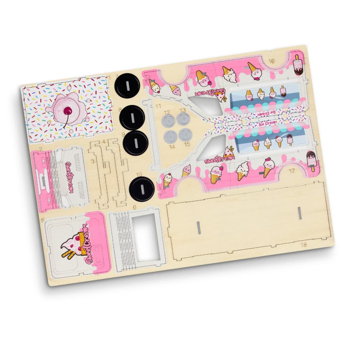 A wooden model kit featuring colourful illustrations of ice cream cones and sprinkles, with various cut-out sections.