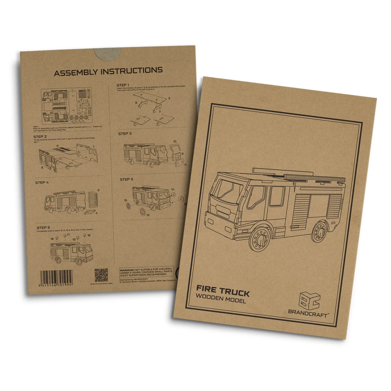 A cardboard packaging featuring assembly instructions for a fire truck wooden model, with illustrations and simple steps.