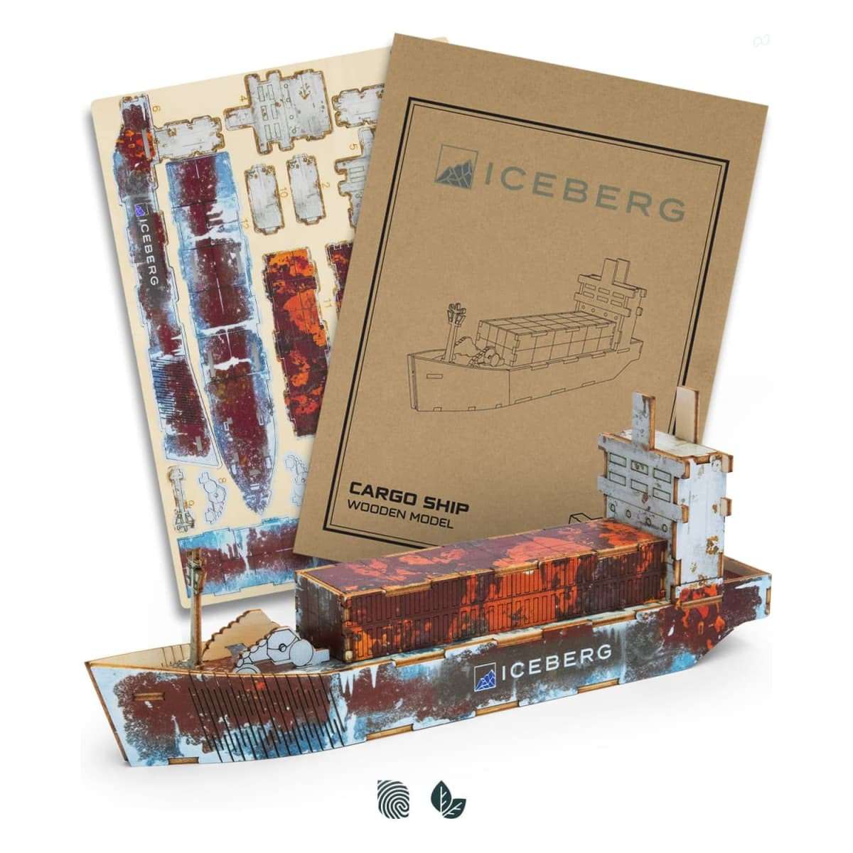 A wooden model of a cargo ship in red and brown, displayed with its cardboard packaging. Includes a logo.