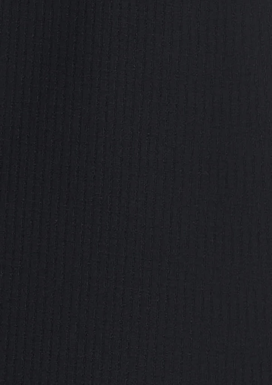 A textured black long sleeve shirt with a button-up design and a branding logo.