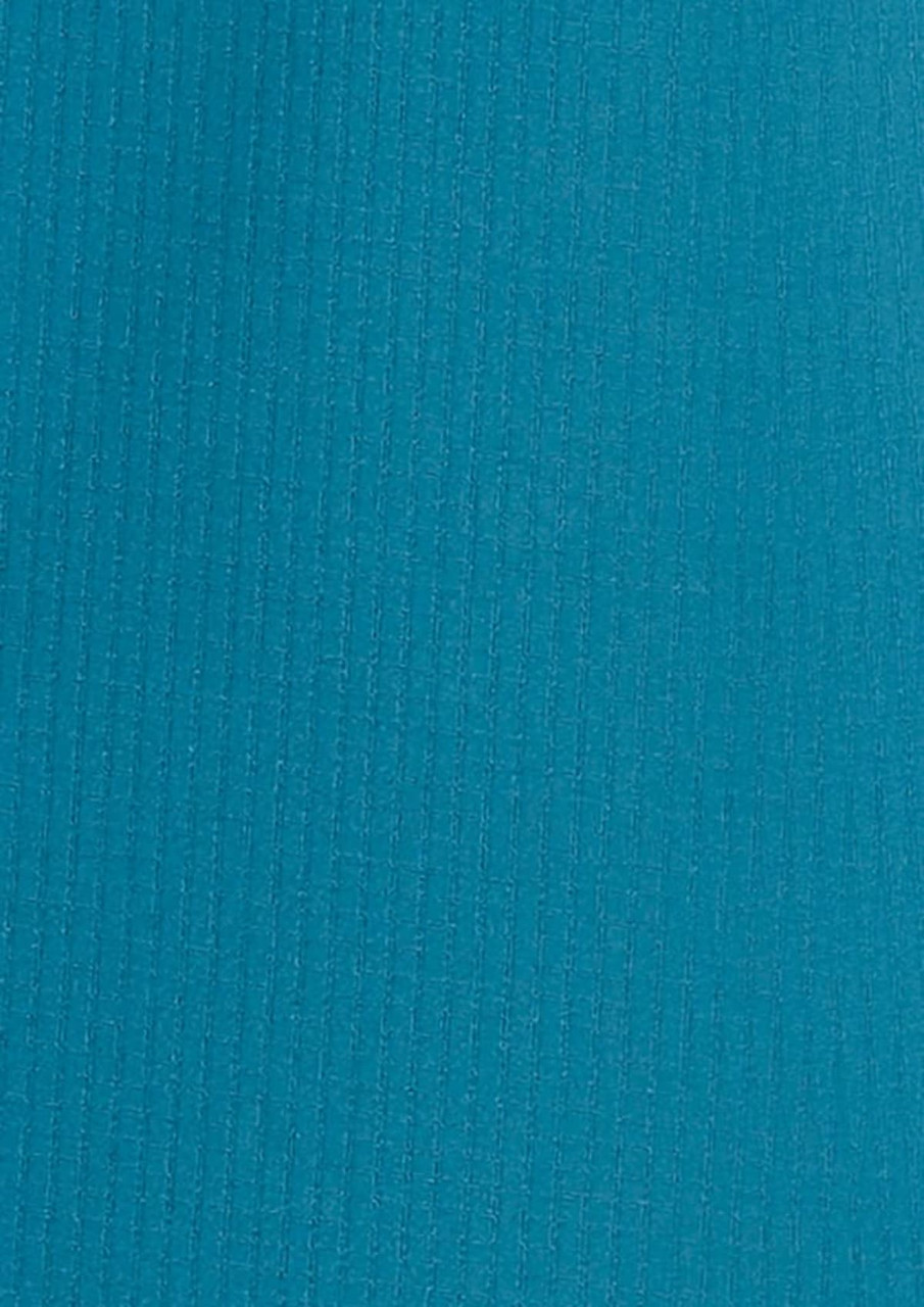 A long sleeve women's outdoor shirt in a vibrant teal colour, featuring a textured fabric and a logo.