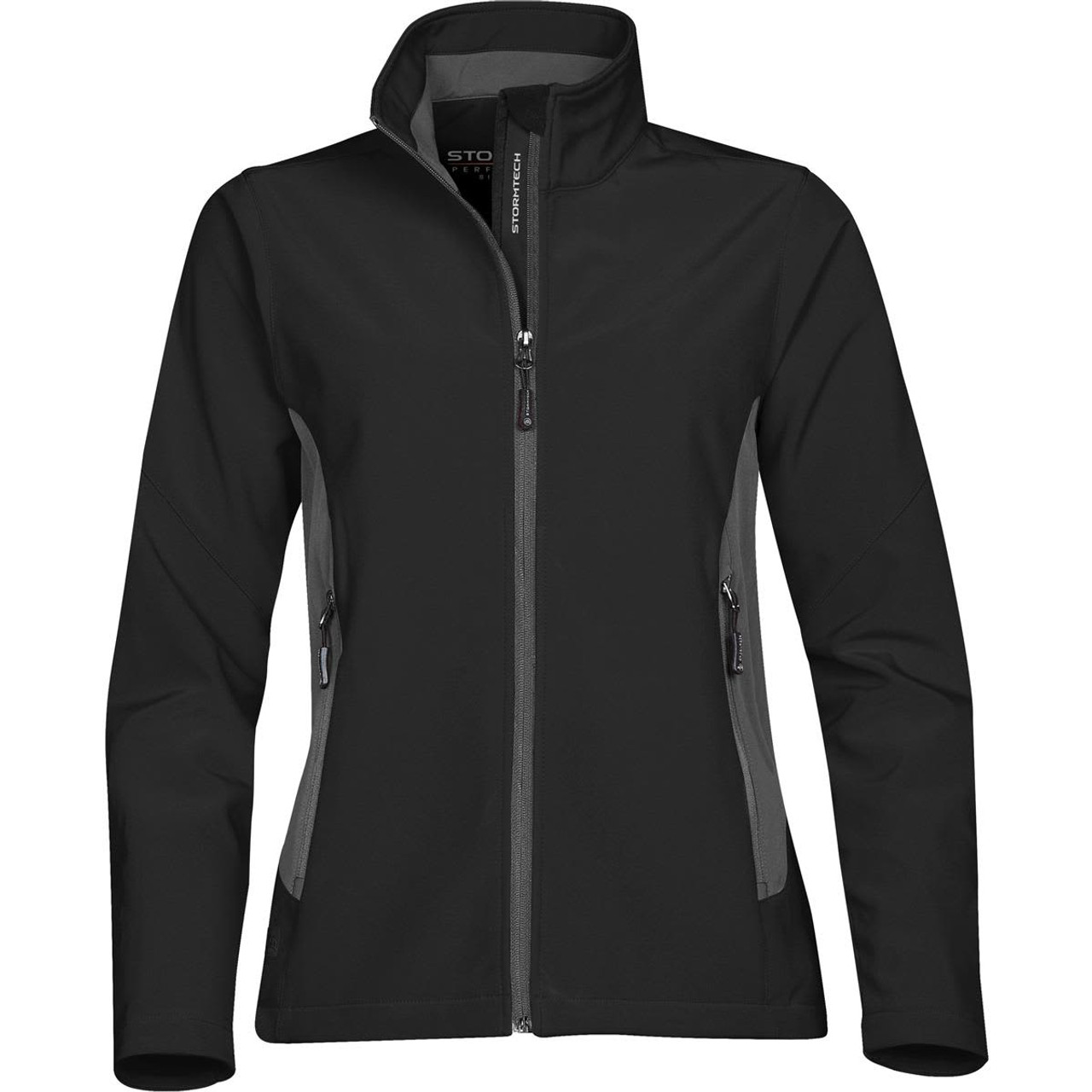 A black women's softshell jacket featuring grey panels and a high collar, with zippered pockets and a logo.