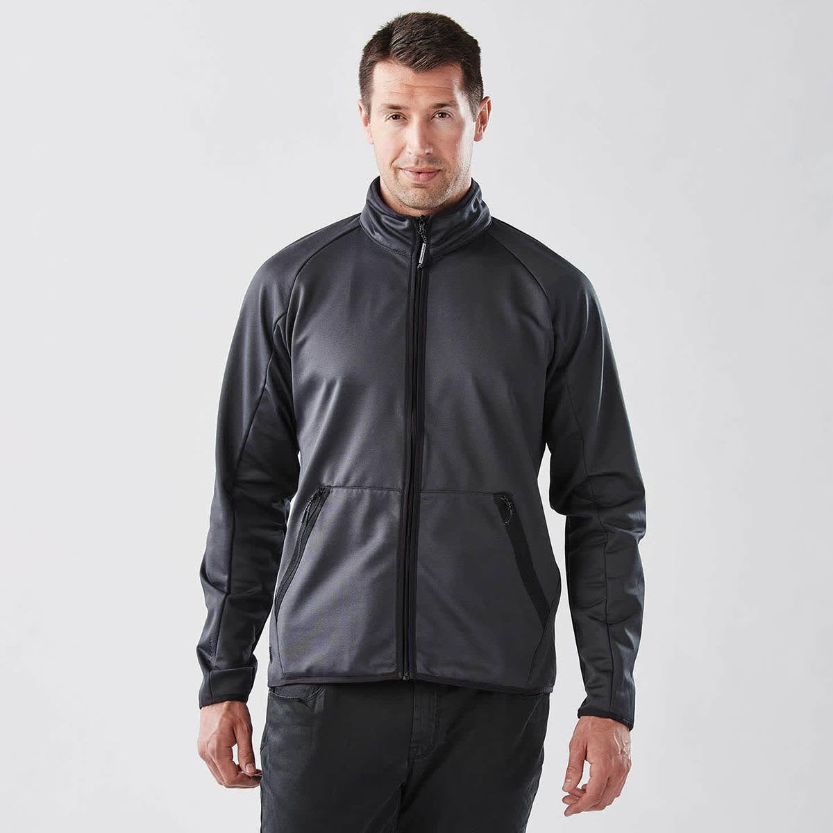 A men's polar fleece jacket in dark grey, featuring a full zip and a subtle logo.