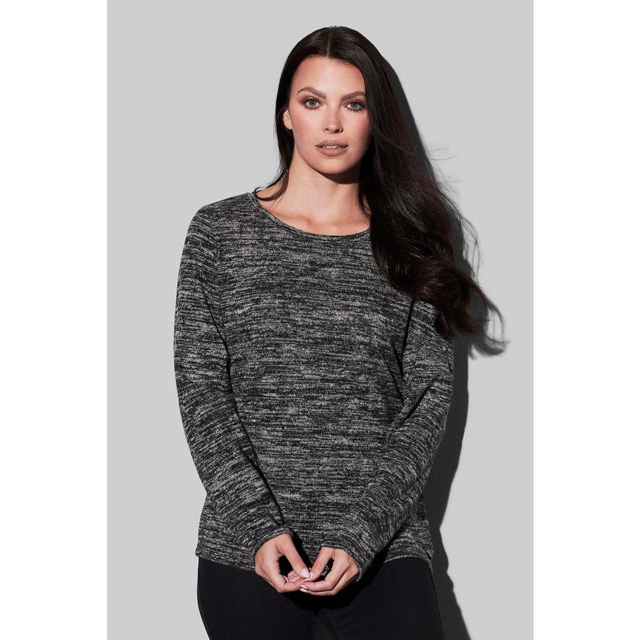 A casual women's knit sweater in black and grey tones, featuring a relaxed fit and long sleeves.