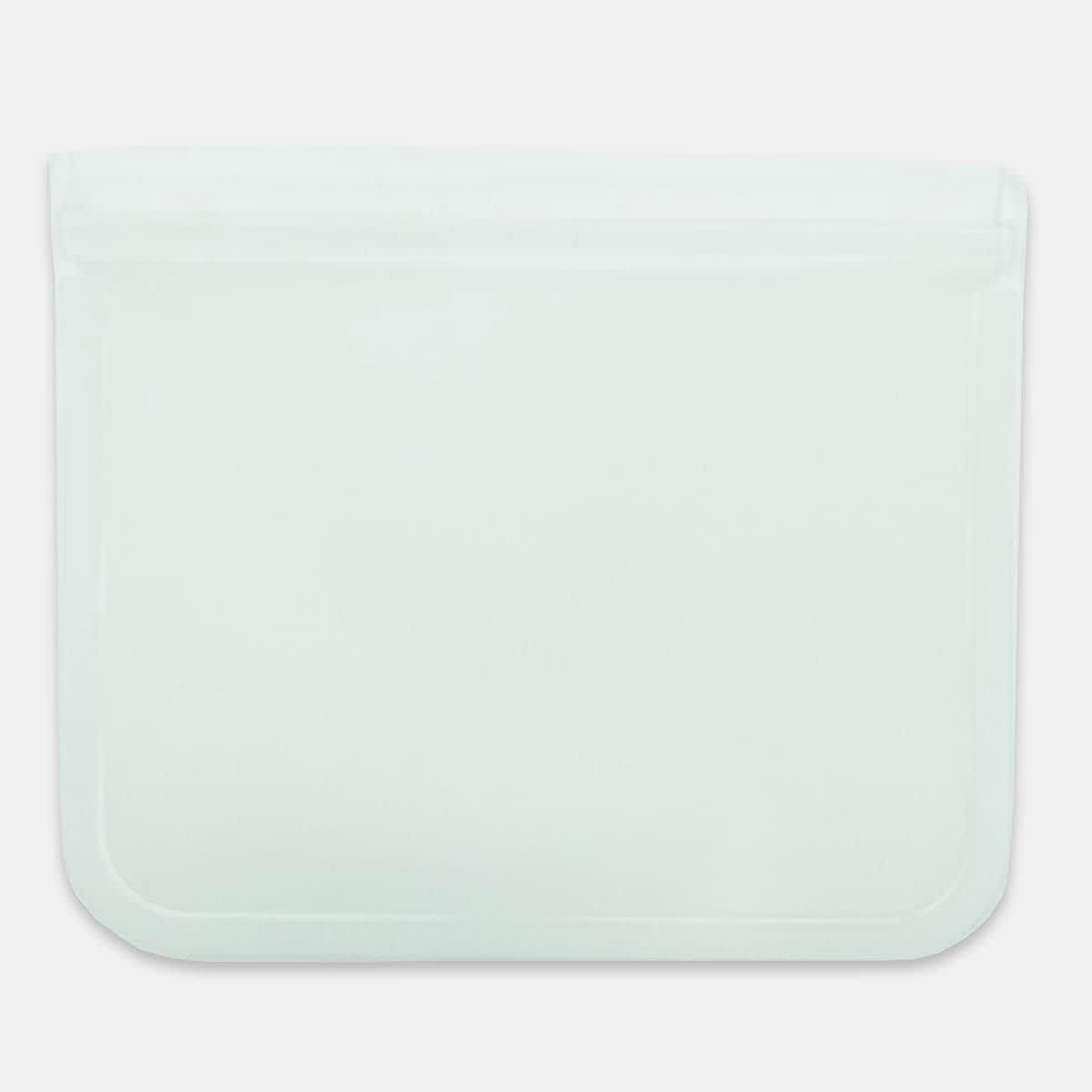 A clear PEVA reusable food storage bag with a zip closure, measuring 21.5 cm x 18 cm. Ideal for various storage needs.