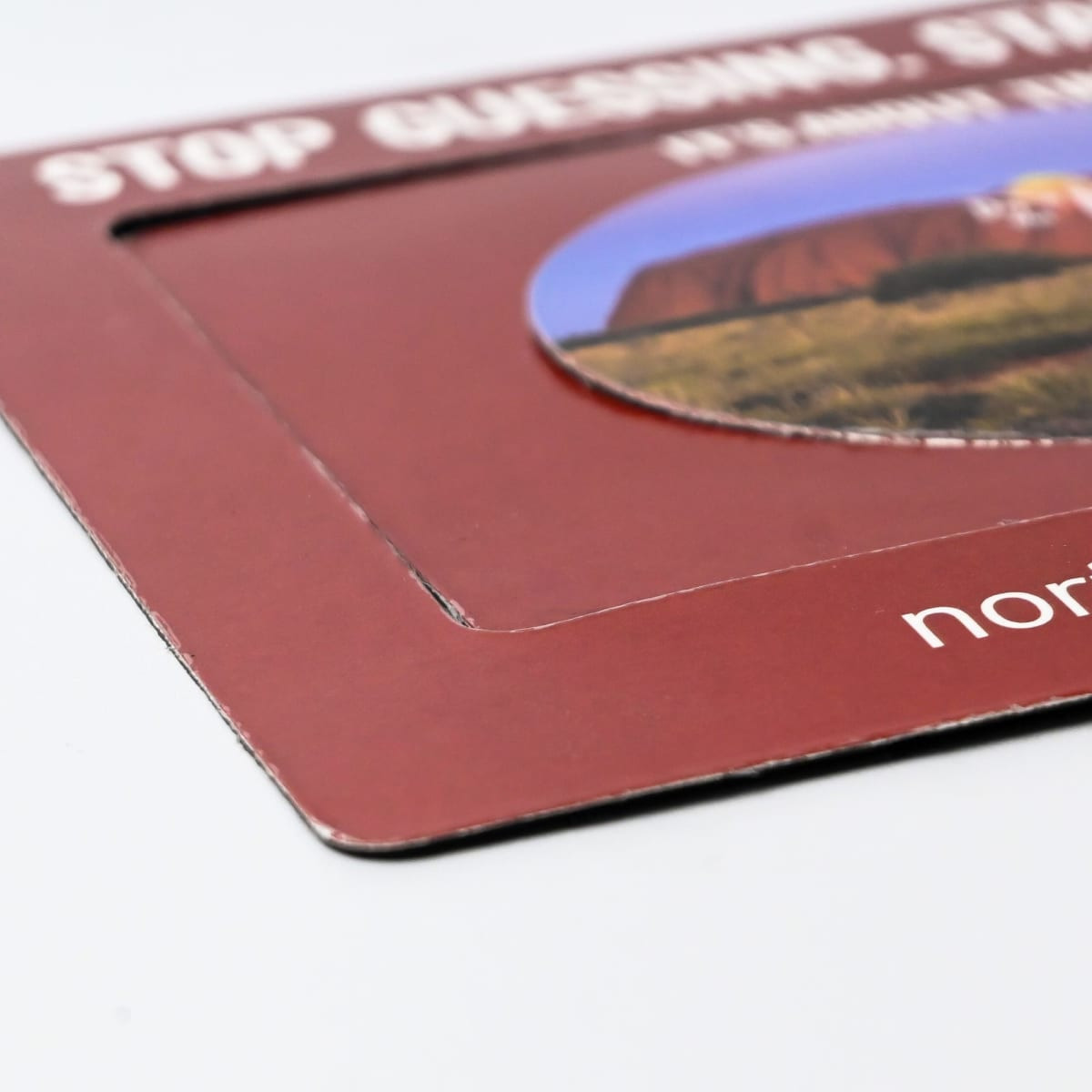 A magnetic photo frame in maroon, featuring a circular cut-out for displaying a photo, with a branding logo.