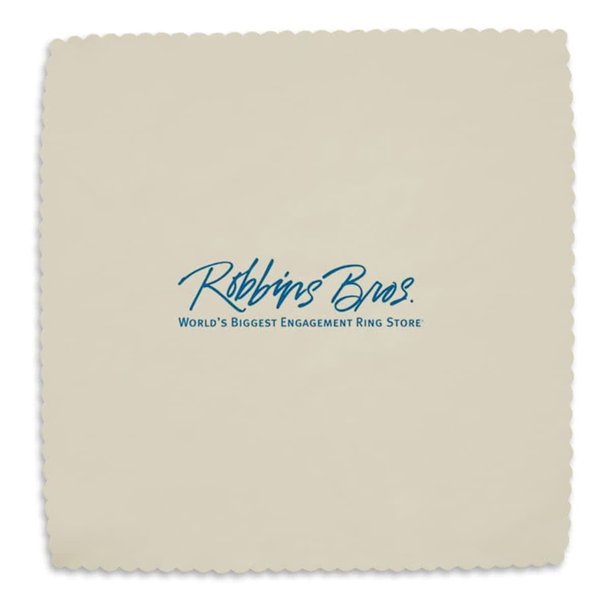 A cream microfibre cleaning cloth featuring a logo. The edges are scalloped for a decorative finish.