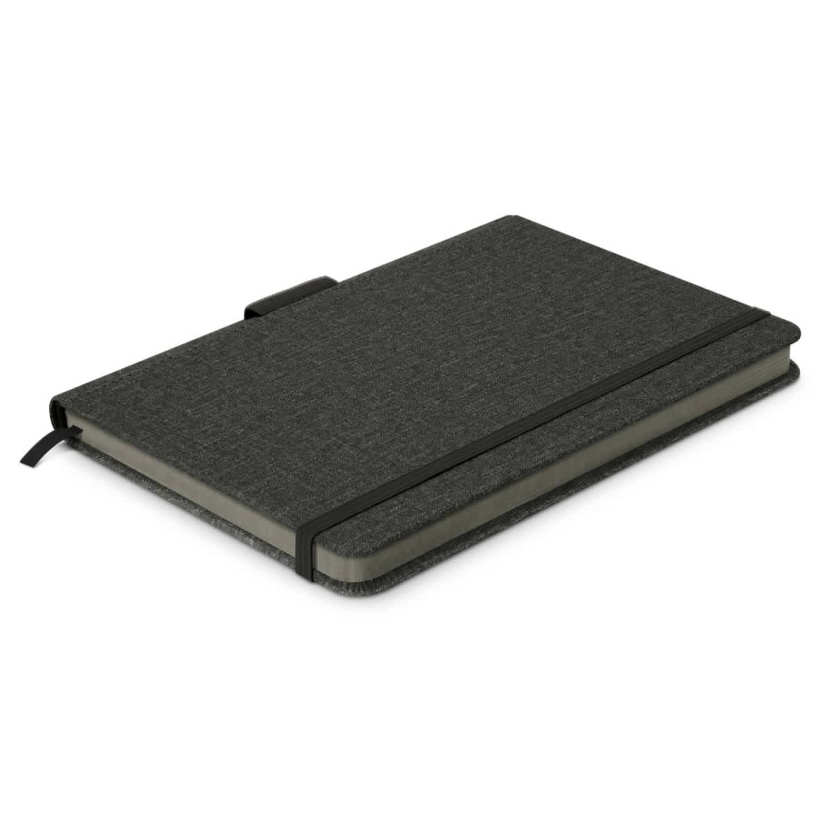 A dark green notebook with a textured cover, featuring an elastic band and a ribbon bookmark. It has a logo on the front.