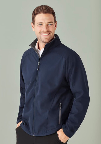 A navy soft shell jacket with a zippered front and side pockets, featuring a collar and a logo. A navy soft shell jacket with a zippered front and side pockets, featuring a collar and a logo.