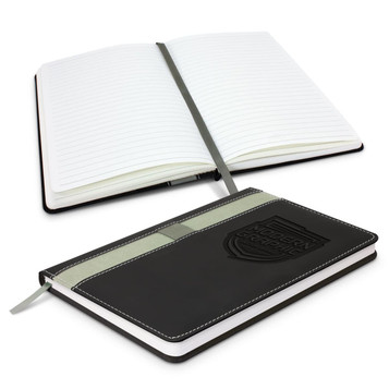 A black Prescott Notebook with a soft cover, featuring lined pages and a ribbon bookmark. It has a logo on the front. A black Prescott Notebook with a soft cover, featuring lined pages and a ribbon bookmark. It has a logo on the front.