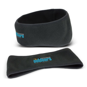 A dark grey ear warmer made of fleece, featuring a logo on the front. Two pieces are displayed.