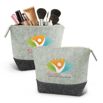 A green and grey cosmetic bag with a logo, filled with makeup items and brushes. A green and grey cosmetic bag with a logo, filled with makeup items and brushes.