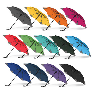 A collection of BLUNT Classic Umbrellas in various colours, including grey, yellow, red, green, blue, and purple, with logos. A collection of BLUNT Classic Umbrellas in various colours, including grey, yellow, red, green, blue, and purple, with logos.