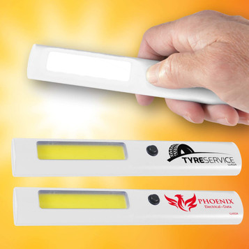 A hand holds a white LED torch with a yellow light strip, featuring two logos on its surface. A hand holds a white LED torch with a yellow light strip, featuring two logos on its surface.