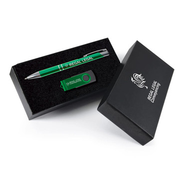A green pen and a green USB drive in a black gift box with a logo.