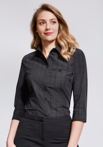 A black checkered women's button-up shirt with 3/4 sleeves and a collar, featuring a small pocket. A black checkered women's button-up shirt with 3/4 sleeves and a collar, featuring a small pocket.