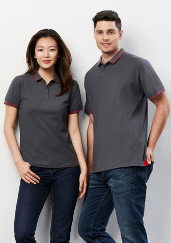 A grey short sleeve polo shirt featuring contrasting red accents, displayed on a male and female model.