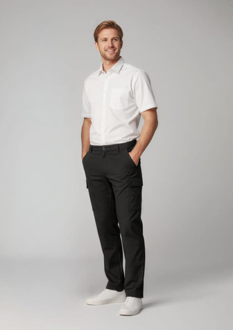 A man is wearing black comfort waist cargo pants with a white short-sleeve shirt and white shoes.