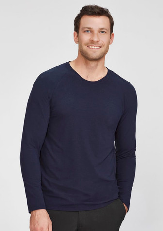 A men's performance long sleeve tee in navy blue, featuring a fitted design and a logo. A men's performance long sleeve tee in navy blue, featuring a fitted design and a logo.