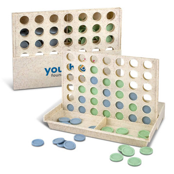 A Four in a Row game set featuring a light-coloured frame with green and blue playing pieces scattered around.