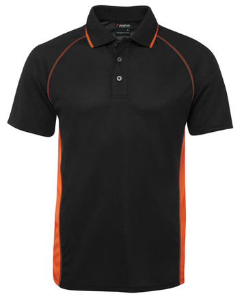 A black polo shirt with orange accents and a collar, featuring buttons and a logo on the label.