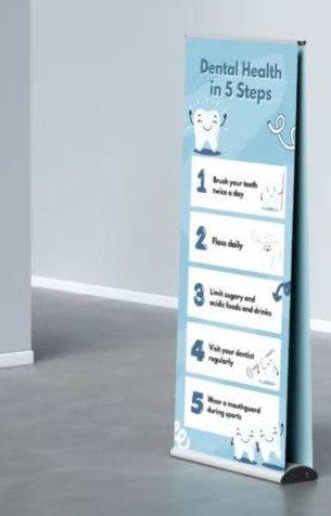 A double-sided pull-up banner, 850mm x 2000mm, featuring a blue design and dental health tips. It includes a logo.