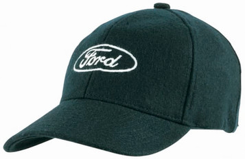 A green Melton wool cap featuring an embroidered logo on the front. The cap has a classic baseball style. A green Melton wool cap featuring an embroidered logo on the front. The cap has a classic baseball style.