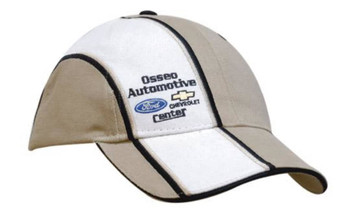 A beige cap with a sandwich peak, crown indent, and embroidered stripes. Features a logo on the front.