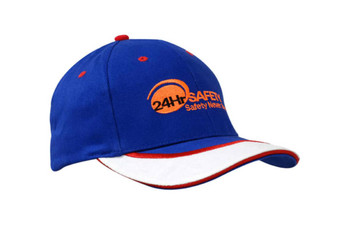 A blue cap with a white sandwich trim and peak indent, featuring an embroidered logo. A blue cap with a white sandwich trim and peak indent, featuring an embroidered logo.