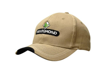 A beige cap with a black peak, featuring contour trim, stitching, and a logo on the front.